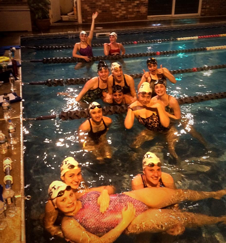 The girls that participated in an over night practice for WTST are still psyched despite how late it is.