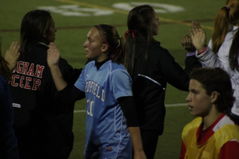 Medfield players are upset by the loss. 