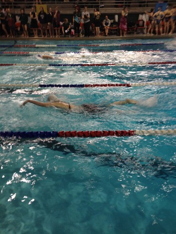 Freshman Amanda Kenn swims the 500 Freestyle