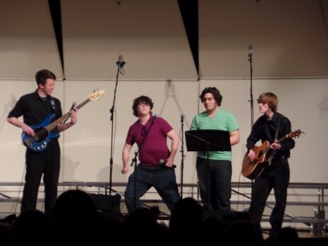 Chris Smith, Liam Nahil, Evan Ayer, and Chris Connelly singing "Pinball Wizard".