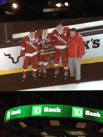 The Division 1 State Championship Trophy is presented to the Captains and Coach Messina. 