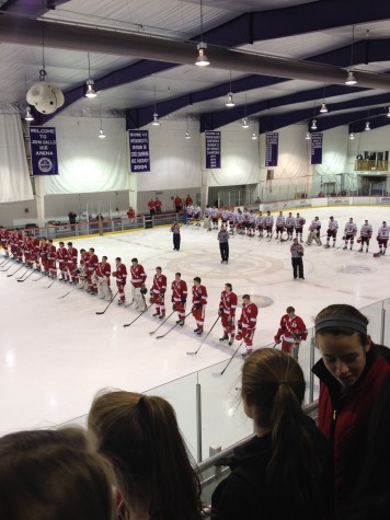Both teams looking towards the flag during the Star Spangled Banner.