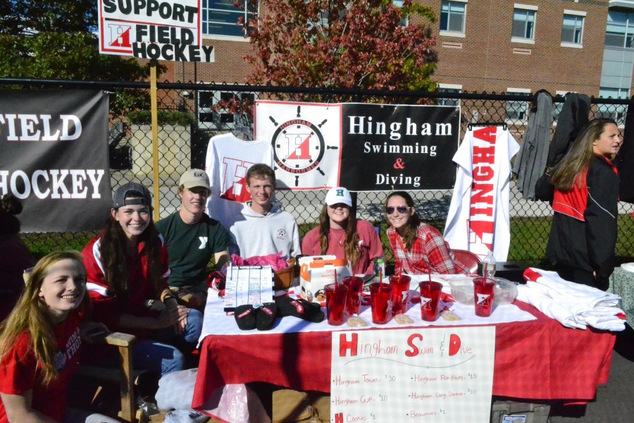 Swim and Dive Team members (from left) Amanda Ken, Maddy Townsend, Cam Baker, Matt Dwyer, Elle O’Connor and Maggie Mulkerrin at their booth for Homecoming.