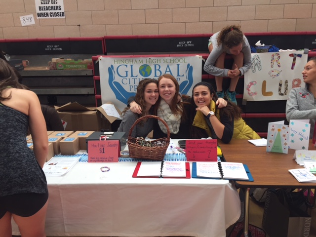 The Global Citizenship Program offering people the chance to send prayers and condolences to the embassies in Lebanon and France.  (Left to Right: Meredith Veldran, Emma Ranocha, Olivia Million)
