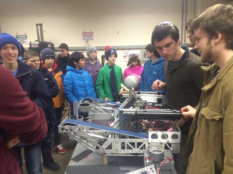Robotics team cocaptains
Billy Harrington (Left) and Paul Barber (right) talk to HMS students about the
team’s robot.