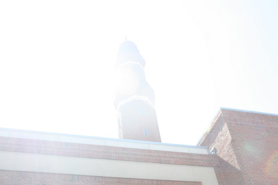 The minaret eclipsed in the sunlight. 