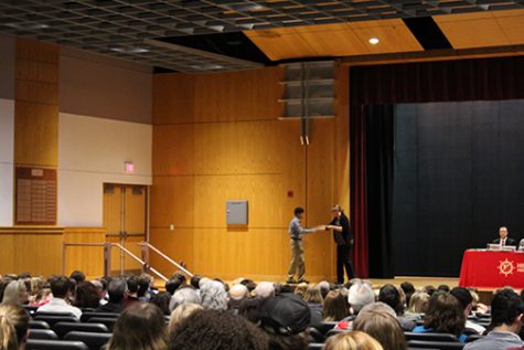 Junior Jonas Fryer receiving an award in the field of mathematics and engineering.