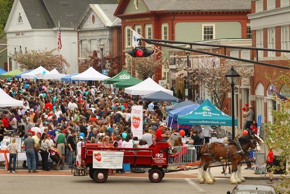 Town residents cram into the square to get a taste of the local flavor. 