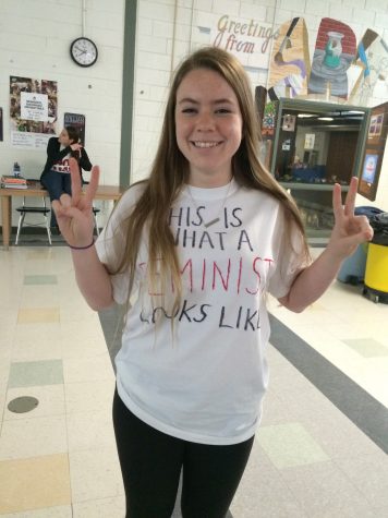 Abby Fennelly poses in her “This is what a feminist looks like” t-shirt.