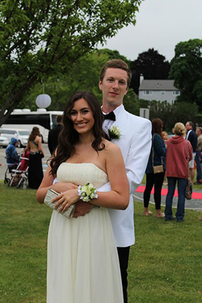 Zander Hicks and Nicole Zaccardi keep up their prom spirit as the sun peaks out from the cloudy sky.
