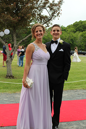 Anne Lipsett and Chris Curran pose for photos on Hingham’s red carpet.