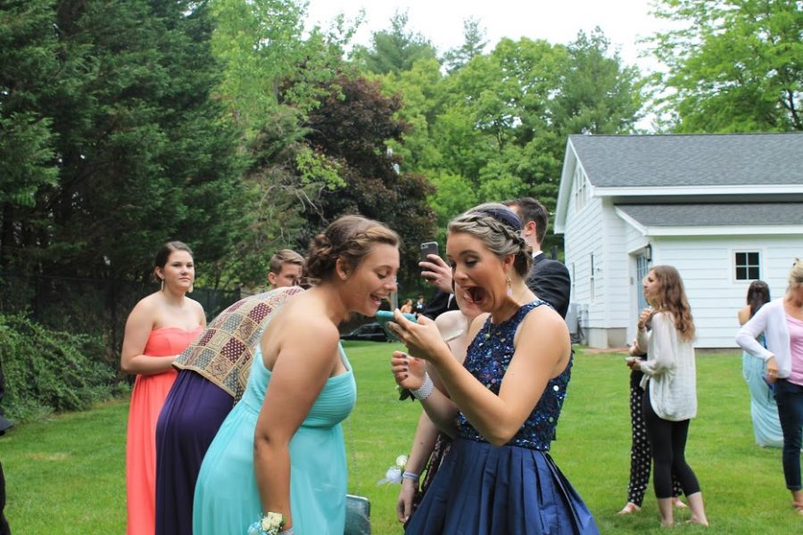 Casey Cosgrove and Lauren Kourafas laughing at a selfie they took