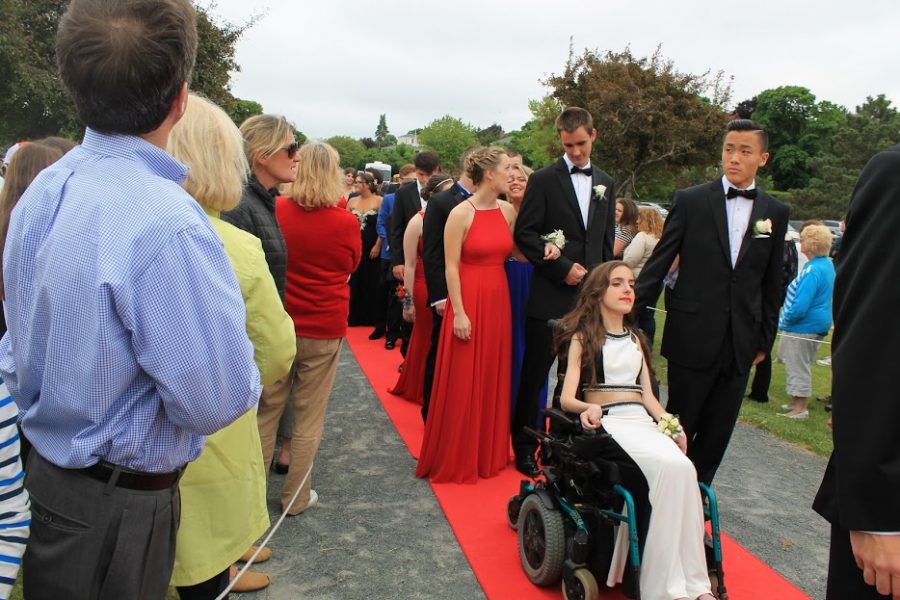 Isabel Allen and Mattias Ling lead others down the carpet. 