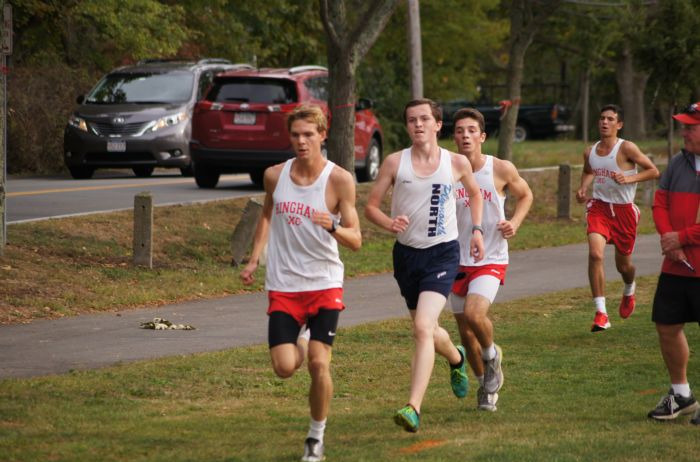 Junior Sam Oomen-Lochtefeld, Senior Scott Myers, and Sophomore Zack Passios (left to right) during their race.
