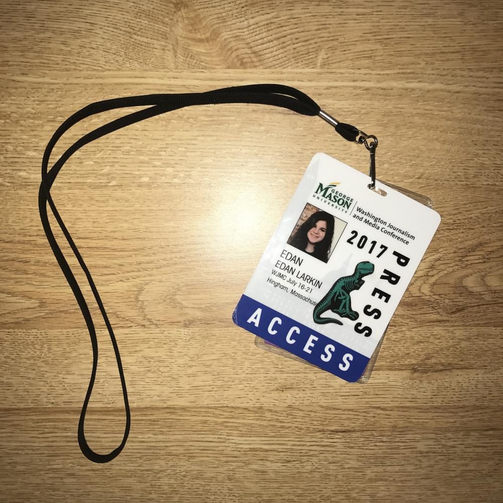 My press pass for the event (with a dinosaur sticker on it).
