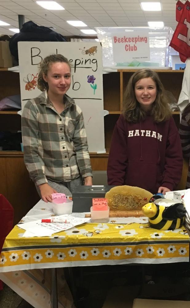 Freshmen Haley Marsden and Grace Kushing representing Bee Keeping Club on Saturday afternoon.