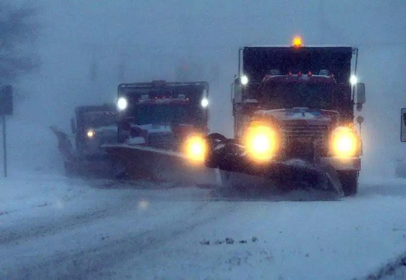 Plows trying to clear up the roads for school starting up the next day in Hanover. 