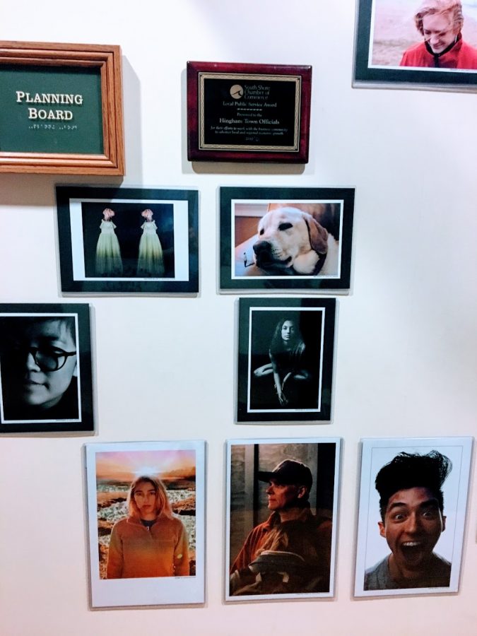 The work of photography students hangs near the Planning Board Room. 