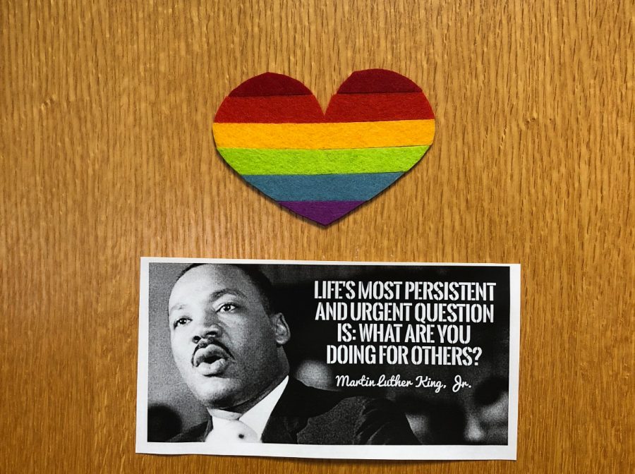 Principal Swanson taped a rainbow heart above the Martin Luther King Jr. quote on his door to show support for Hinghams LGBT+ students and faculty.