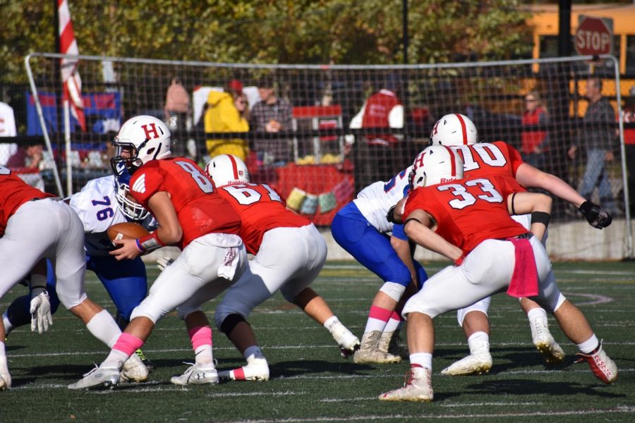 Junior Owen O’Brien takes the snap. Most of Hingham’s plays were running plays, many of which going for over ten yards.