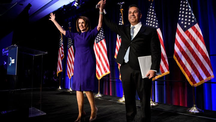 House Minority Leader Nancy Pelosi (D-CA) and Representative Ben Ray Lujan (D-MN), DCCC Chairman, celebrate a projected Democratic Party takeover of the House of Representatives during a midterm election night party hosted by the Democratic Congressional Campaign Committee on November 7, 2018 in Washington, DC. (BRENDAN SMIALOWSKI/AFP/Getty Images)
