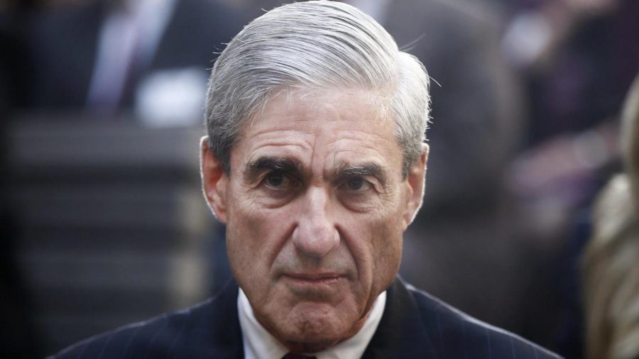 Mueller+has+a+long+history+in+investigation.+In+this+2013+photo%2C+Mueller+delivers+a+stoic+gaze+during+an+FBI+ceremony.+Photo+by+Charles+Dharapak+%3A+AP