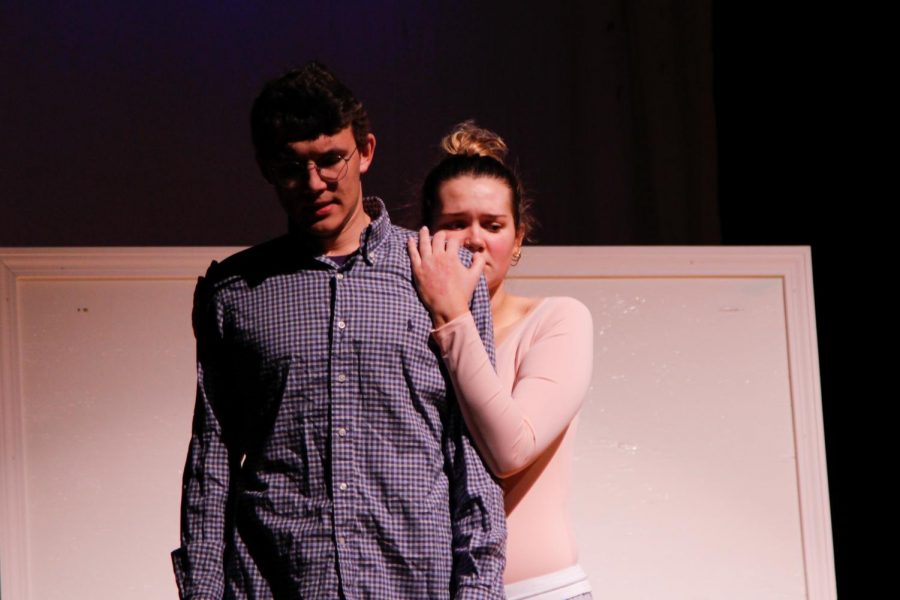 Ophelia (Senior Casey Hussey) embraces Jeb (Senior Andersson Perry) after a vulnerable moment.