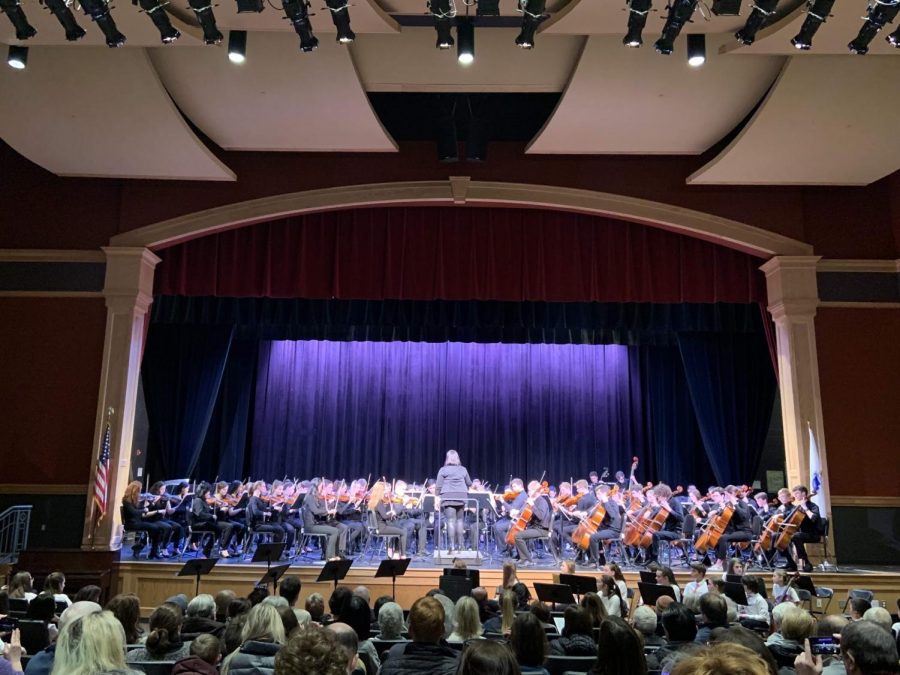 The Hingham High School Orchestra, conducted by Phaedre Sassano, in their rendition of “Crazy Train.” 
