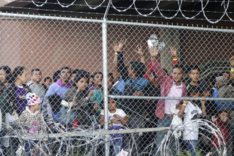 Immigrants+line+up+in+hopes+of+gaining+entrance+to+the+United+States+at+a+detention+center+in+El+Paso%2C+Texas.+Photo+by+Cedar+Attanasio+%28AP%29