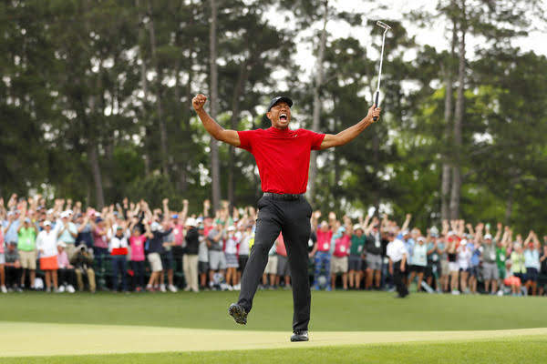 Tiger Woods celebrates in a moment of pure elation after winning his fifth Masters title.