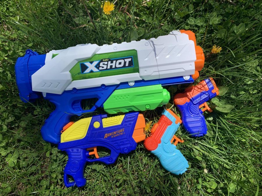 Senior participants in Senior Assassin gather a variety of water guns in order to be best prepared for the game.