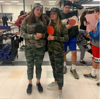 Seniors Julia Foley and Riley St. Pierre dressed up in camouflage, and were recognized for having the best team costume at the event.
