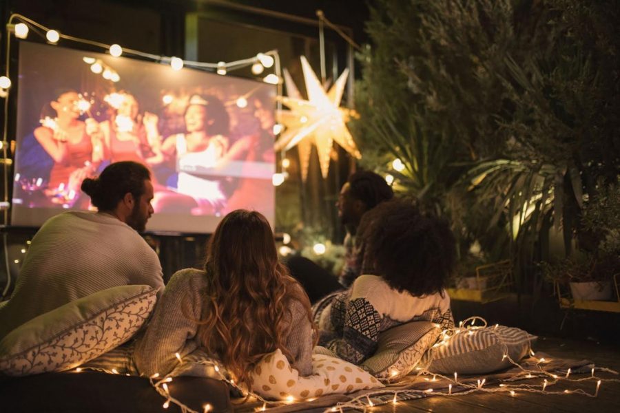 Instead of going to the movie theaters this summer, try bringing the theater right into your backyard!