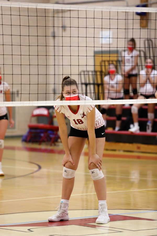 Junior middle hitter Lilly Steiner stands at a height of 63. This combined with her remarkable volleyball skills marks her as a star asset to the team.