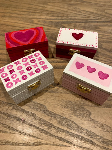 One of the many creative valentine alternatives to a typical get-together includes painting jewelry or gift boxes.