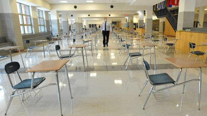When returning to school for in-person learning, desks will have 3-6 feet of physical distancing.