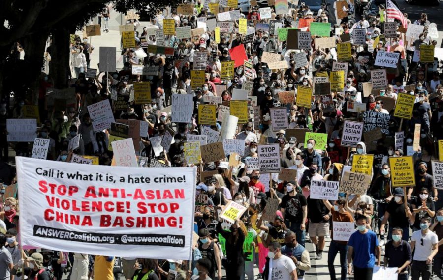 A large crowd gathers to protest anti-Asian violence and racism on March 27, 2021, in Los Angeles.