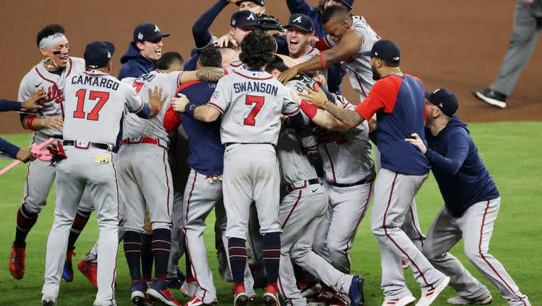 The+Braves+celebrate+the+end+of+their+Cinderella+story+with+their+World+Series+win+over+the+Astros.