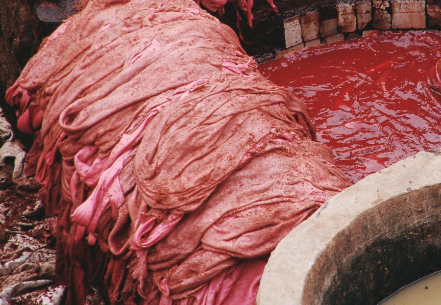 Fabric being dyed in a factory.
