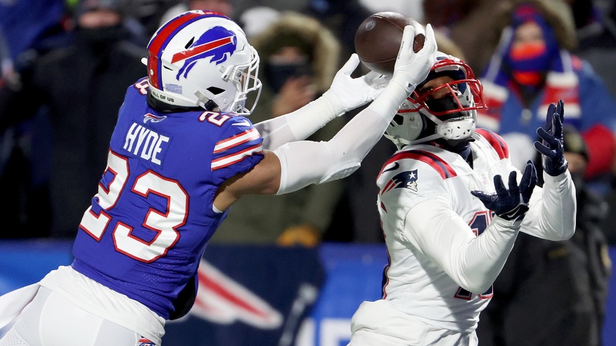 Bills cornerback Micah Hyde jumps up to make a great endzone interception over Patriots wide receiver Nelson Agholor in the first quarter of Saturdays game. 
