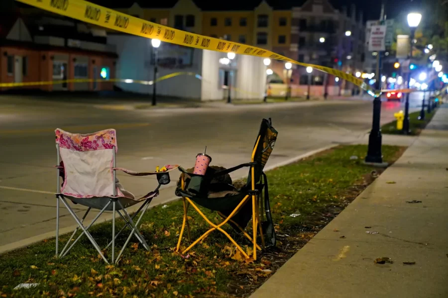 Chairs are left abandoned on Main Street after a car plowed through a holiday parade in Waukesha, Wis., on Nov. 21.