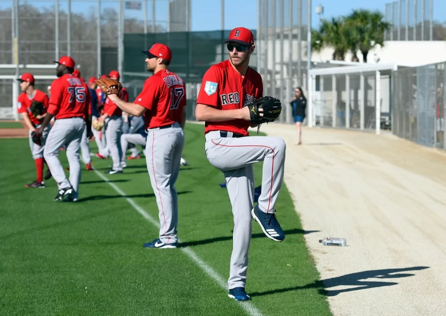 Red Sox starters Chris Sale and Nathan Eovaldi warm up their arms during a spring training workout in Jetblue Park located in Fort Myers, Florida.
