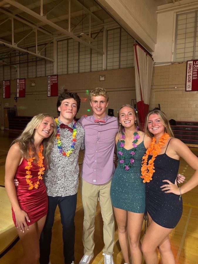 Senior Ava Knight, Lizzie Beyer and Mathilde Megard join sophomores Tanner Whitehouse and Matty Cummings for a group picture.