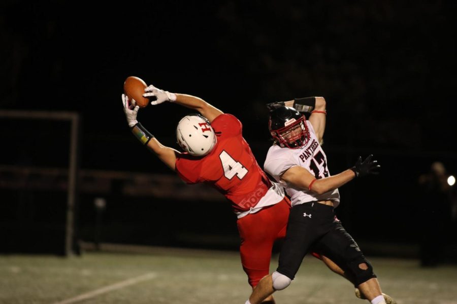 Senior Tight End Cam Dobson making an incredible leaping grab in the first quarter over a Whitman-Hanson defender.