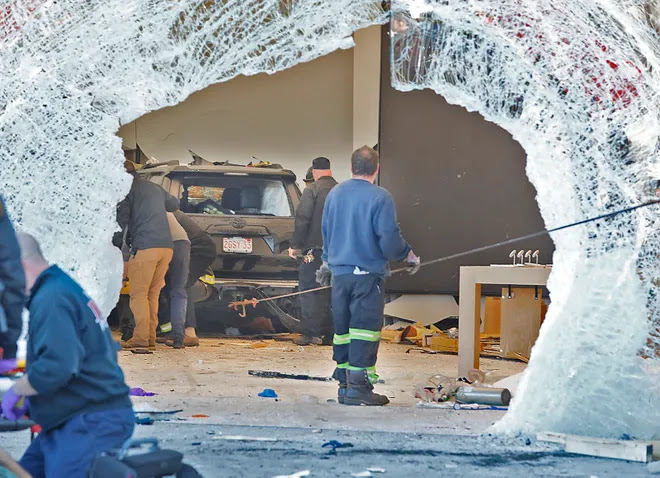 Following the crash, the Apple Store at Derby Street in Hingham bore a massive hole in its glass storefront.