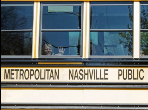 A crying child leaving the Covenant School on a bus after the shooting. 
By: Reuters