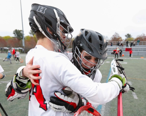 Ben Farrington (left) congratulates Hingham goalie, Nate Hoffman (right) after their victory over Lincoln-Sudbury in the Coaches Cup Championship on Saturday, April 22, 2023.