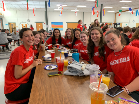 A group of seniors having breakfast before they went off on the Harbormen Helping Hingham Day.