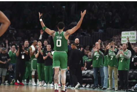 Jason Tatum turns to the Boston crowd at TD Garden for applause after stepping off the court in the 4th quarter of Game 7 against the Philadelphia 76er’s. (AP Photo/Steven Senne)