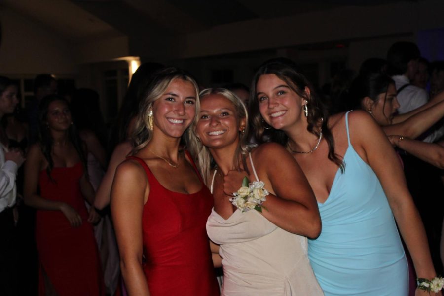  Audrey Nolan, Erin Packard, and Elyse Jones pause for a picture.